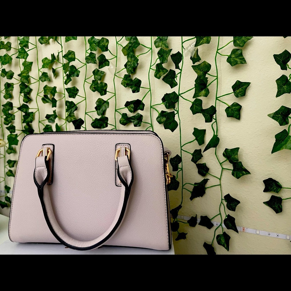 A beautiful bag with with a light purple